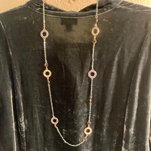 Stunning Loft necklace with hints of turquoise ribbon and purple accents